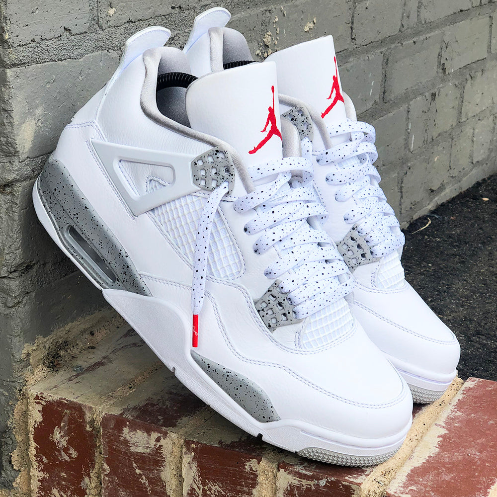jordan 4 white cement on feet